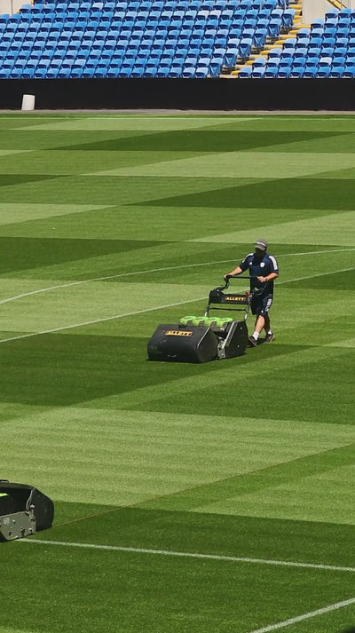 Allett Mowers cutting grass and laws on professional sports pitches and home gardens.